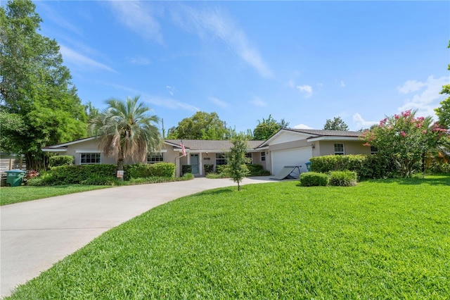 1770 Chinook Trl, Maitland, FL 32751 - single story home with concrete driveway, an attached garage, a front yard, and stucco siding