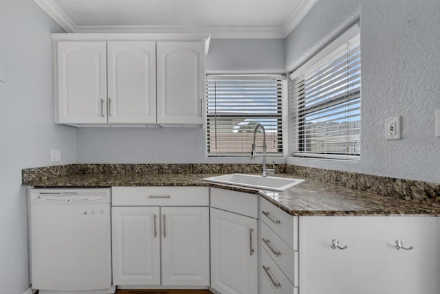 1021 N Forest Ave, Orlando, FL 32803 - kitchen with white dishwasher, a sink, white cabinetry, ornamental molding, and dark stone counters