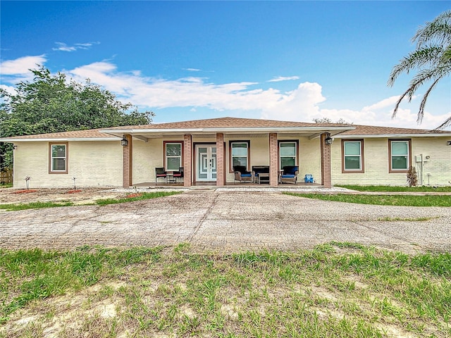 516 Petes Ln, Davenport, FL 33837 - view of front of house featuring a porch