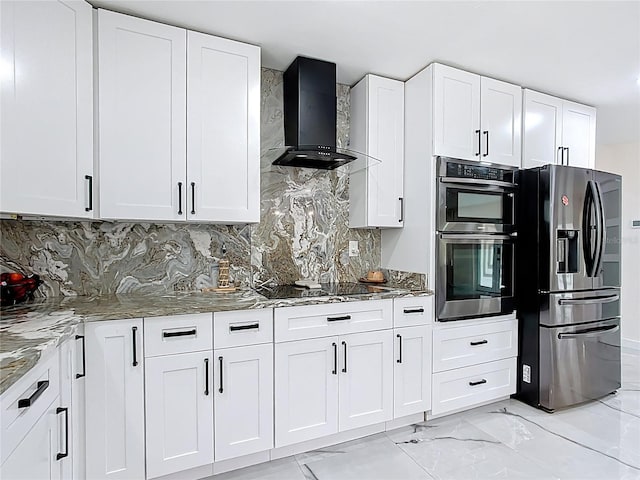 516 Petes Ln, Davenport, FL 33837 - kitchen with wall chimney range hood, stainless steel appliances, light stone countertops, and light marble finish flooring
