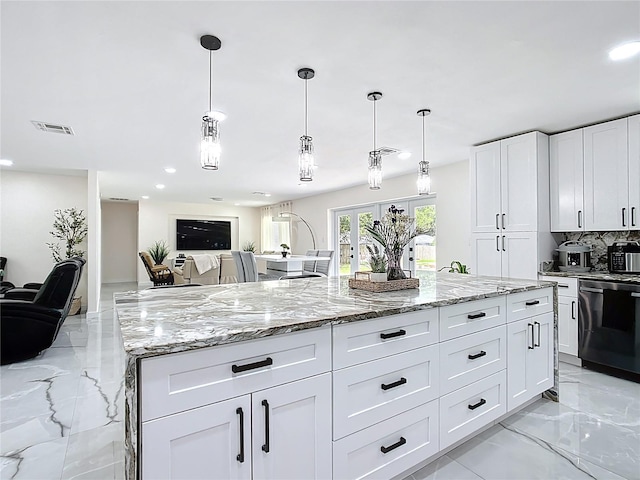 516 Petes Ln, Davenport, FL 33837 - kitchen with dishwasher, tasteful backsplash, light marble finish flooring, light stone countertops, and recessed lighting