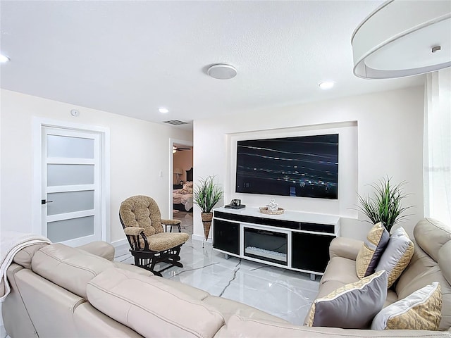 516 Petes Ln, Davenport, FL 33837 - living room with light marble finish floors and recessed lighting