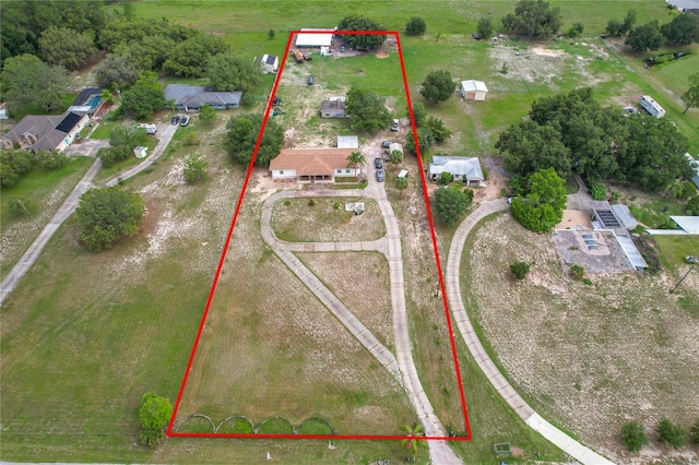 516 Petes Ln, Davenport, FL 33837 - aerial view of property and surrounding area featuring property boundaries highlighted