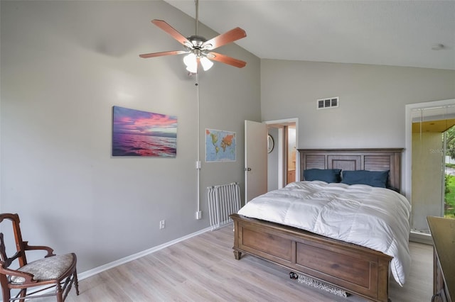1051 S Highland St Unit 5E, Mount Dora, FL 32757 - bedroom featuring light wood finished floors, high vaulted ceiling, baseboards, a ceiling fan, and attic access