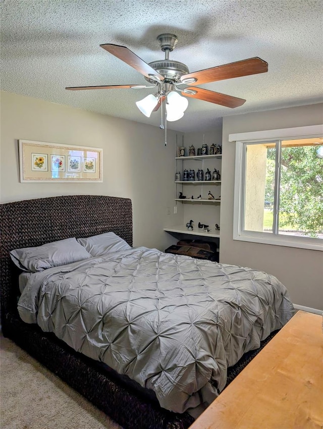 1051 S Highland St Unit 5E, Mount Dora, FL 32757 - bedroom with ceiling fan and a textured ceiling