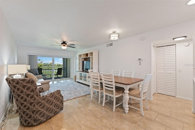 6210 Sun Blvd Unit 206, Saint Petersburg, FL 33715 - dining room featuring ceiling fan and light tile patterned floors