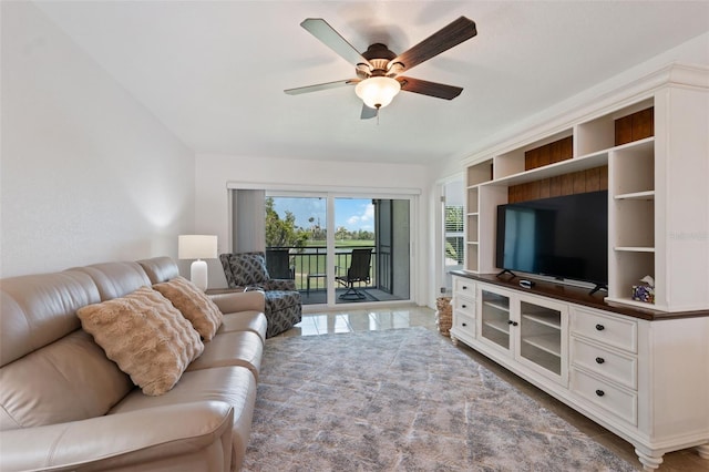 6210 Sun Blvd Unit 206, Saint Petersburg, FL 33715 - living area with a ceiling fan and tile patterned floors