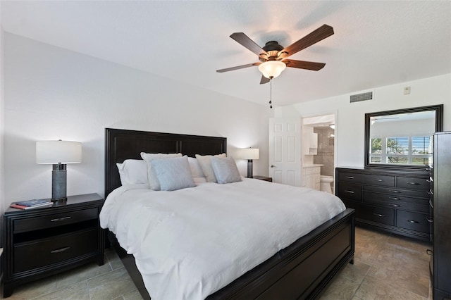 6210 Sun Blvd Unit 206, Saint Petersburg, FL 33715 - bedroom featuring connected bathroom and a ceiling fan