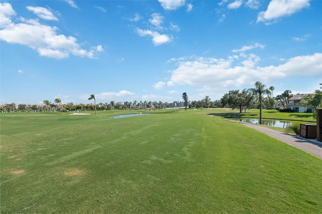 6210 Sun Blvd Unit 206, Saint Petersburg, FL 33715 - surrounding community featuring a water view, a yard, and view of golf course