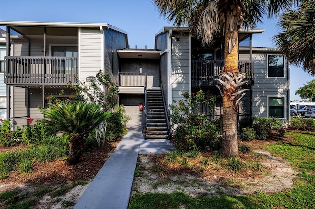 3748 Idlebrook Cir Unit 202, Casselberry, FL 32707 - view of property featuring stairs