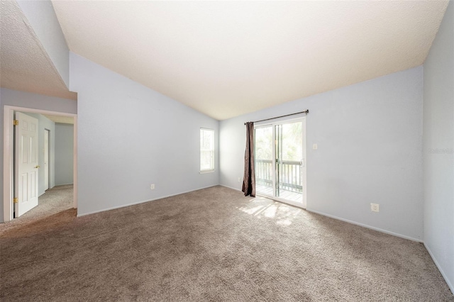 3748 Idlebrook Cir Unit 202, Casselberry, FL 32707 - carpeted spare room featuring vaulted ceiling