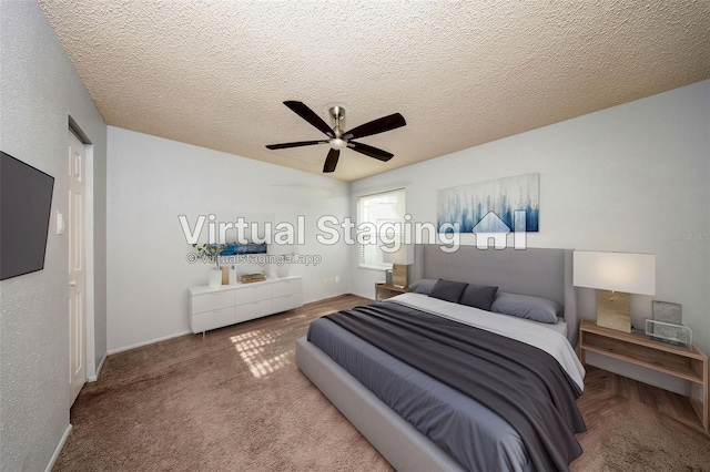 3748 Idlebrook Cir Unit 202, Casselberry, FL 32707 - bedroom with carpet, a ceiling fan, a textured ceiling, and baseboards