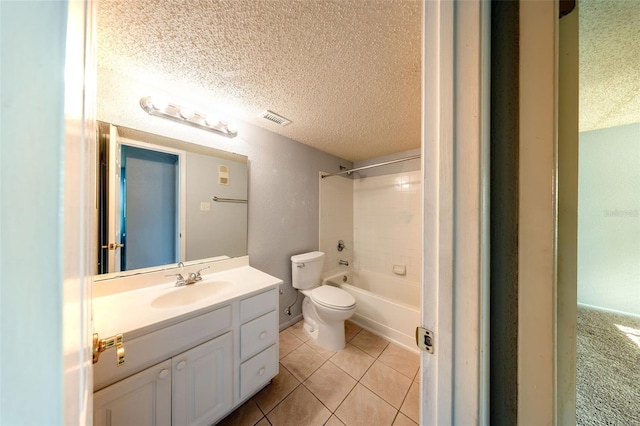 3748 Idlebrook Cir Unit 202, Casselberry, FL 32707 - bathroom featuring a textured ceiling, toilet, vanity, tile patterned flooring, and washtub / shower combination