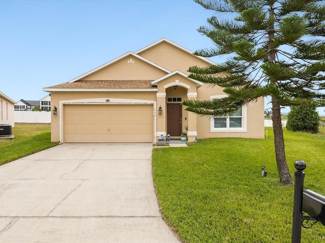 204 Cotswold Cir, Davenport, FL 33837 - view of front facade featuring stucco siding, driveway, a garage, and central AC unit