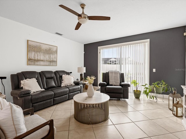 204 Cotswold Cir, Davenport, FL 33837 - living room with ceiling fan and light tile patterned floors