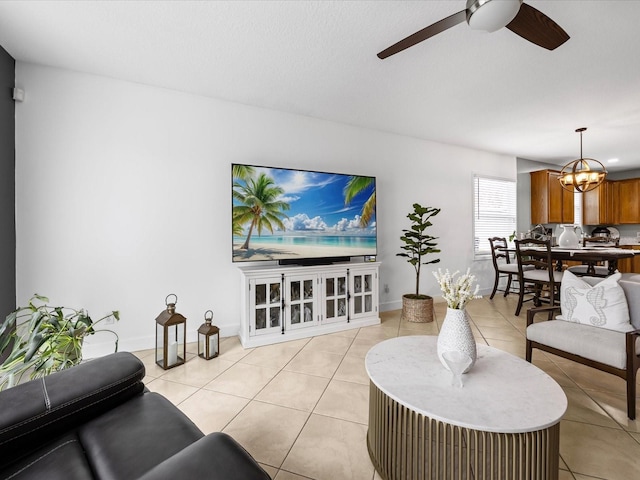 204 Cotswold Cir, Davenport, FL 33837 - living area featuring ceiling fan, light tile patterned floors, and a chandelier