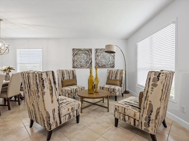 204 Cotswold Cir, Davenport, FL 33837 - sitting room featuring light tile patterned flooring, a chandelier, and baseboards