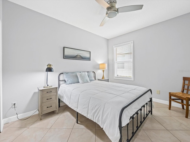 204 Cotswold Cir, Davenport, FL 33837 - bedroom with light tile patterned floors, baseboards, and a ceiling fan
