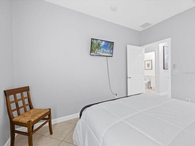 204 Cotswold Cir, Davenport, FL 33837 - bedroom with light tile patterned floors and baseboards