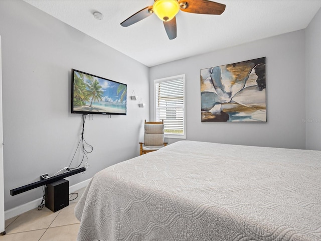 204 Cotswold Cir, Davenport, FL 33837 - tiled bedroom with baseboards and ceiling fan