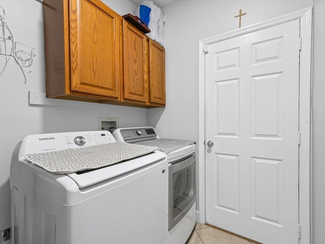 204 Cotswold Cir, Davenport, FL 33837 - laundry room with cabinet space and washing machine and clothes dryer