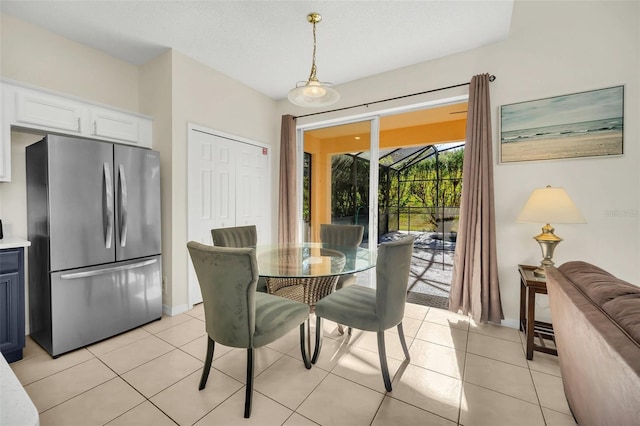 8622 La Isla Dr, Kissimmee, FL 34747 - dining room with light tile patterned floors and baseboards