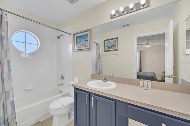 8622 La Isla Dr, Kissimmee, FL 34747 - full bath featuring ensuite bath, shower / bathtub combination with curtain, vanity, toilet, and a ceiling fan