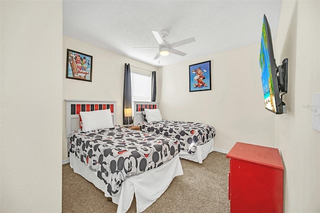8622 La Isla Dr, Kissimmee, FL 34747 - bedroom featuring carpet floors, ceiling fan, baseboards, and a textured ceiling