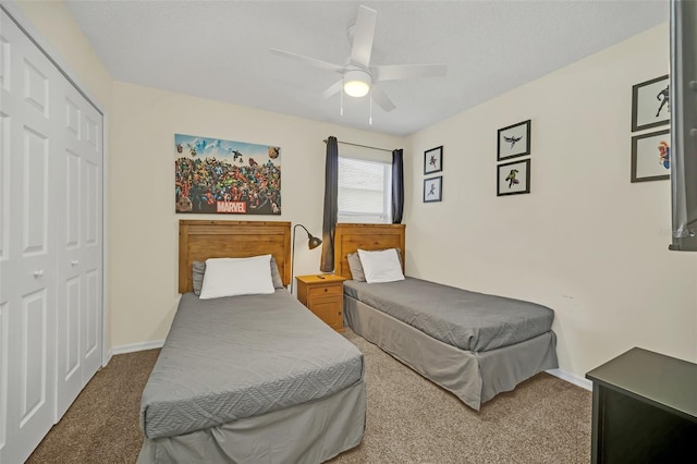 8622 La Isla Dr, Kissimmee, FL 34747 - carpeted bedroom with a closet, a ceiling fan, and baseboards