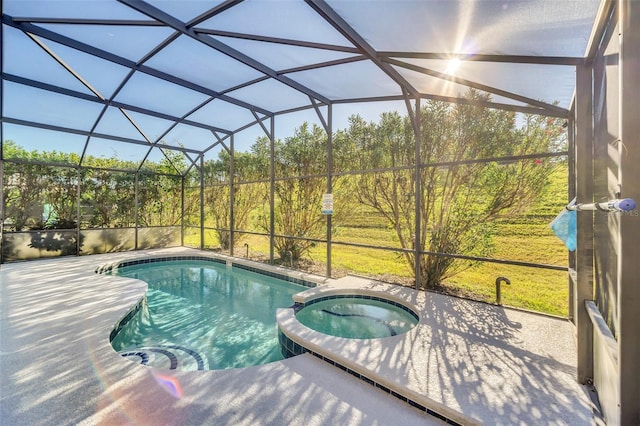 8622 La Isla Dr, Kissimmee, FL 34747 - view of pool featuring a pool with connected hot tub, a lanai, and a patio area