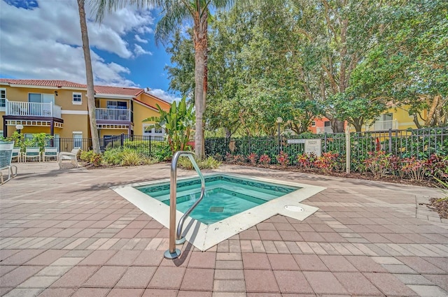 8622 La Isla Dr, Kissimmee, FL 34747 - view of pool featuring a hot tub, a patio area, and a pool