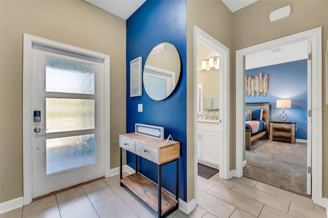 424 Ocean Course Ave, Davenport, FL 33896 - entryway featuring light tile patterned flooring