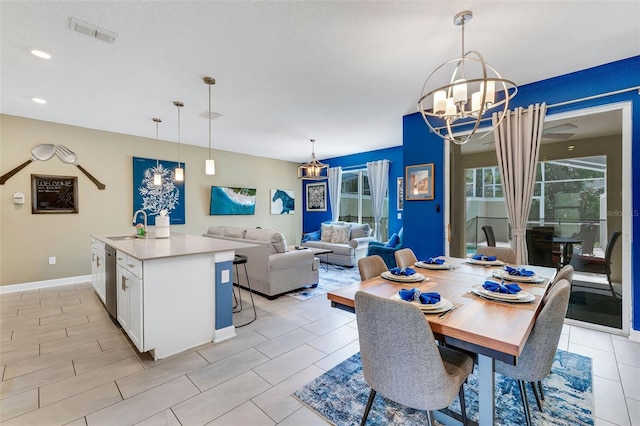 424 Ocean Course Ave, Davenport, FL 33896 - dining area with a chandelier and recessed lighting