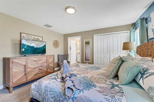 424 Ocean Course Ave, Davenport, FL 33896 - bedroom featuring carpet, a closet, and ensuite bathroom