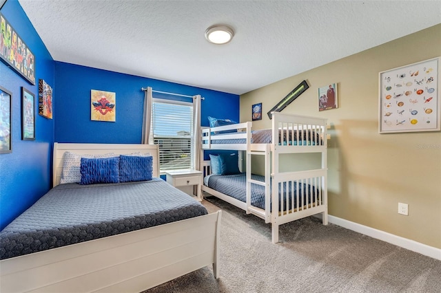 424 Ocean Course Ave, Davenport, FL 33896 - carpeted bedroom with baseboards and a textured ceiling