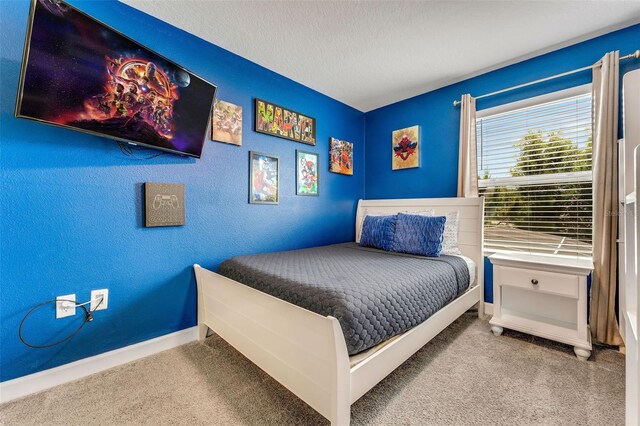 424 Ocean Course Ave, Davenport, FL 33896 - bedroom with carpet and a textured ceiling