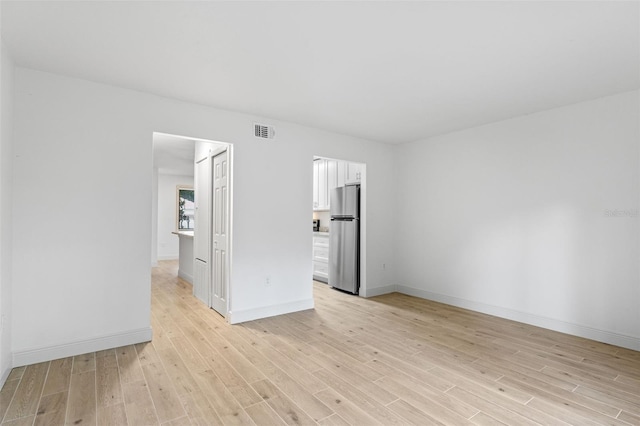 131 Stefanik Rd, Winter Park, FL 32792 - empty room featuring light wood-style flooring and baseboards