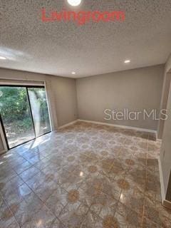 131 Stefanik Rd, Winter Park, FL 32792 - spare room featuring baseboards and recessed lighting