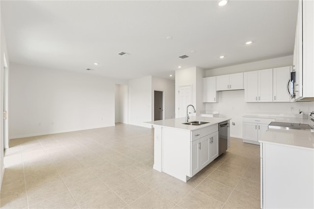 797 Lemon Ave, Fruitland Park, FL 34731 - kitchen featuring a sink, appliances with stainless steel finishes, open floor plan, recessed lighting, and a kitchen island with sink