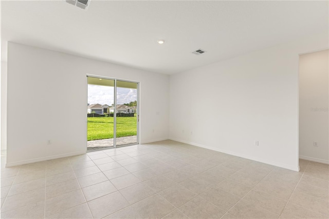 797 Lemon Ave, Fruitland Park, FL 34731 - empty room with light tile patterned floors and baseboards