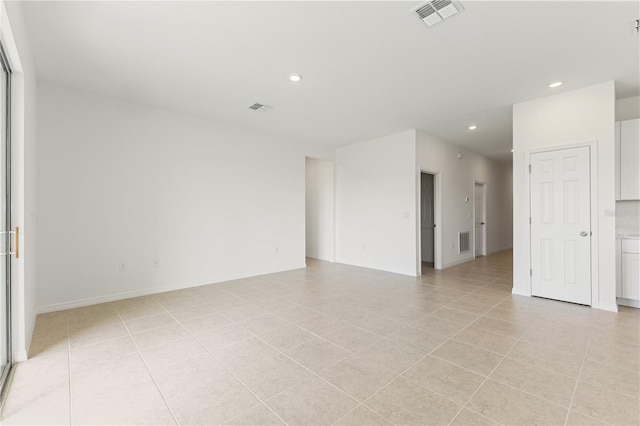 797 Lemon Ave, Fruitland Park, FL 34731 - spare room featuring recessed lighting, light tile patterned floors, and baseboards