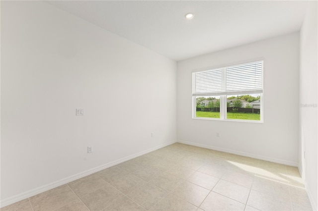 797 Lemon Ave, Fruitland Park, FL 34731 - unfurnished room with baseboards, light tile patterned flooring, and recessed lighting