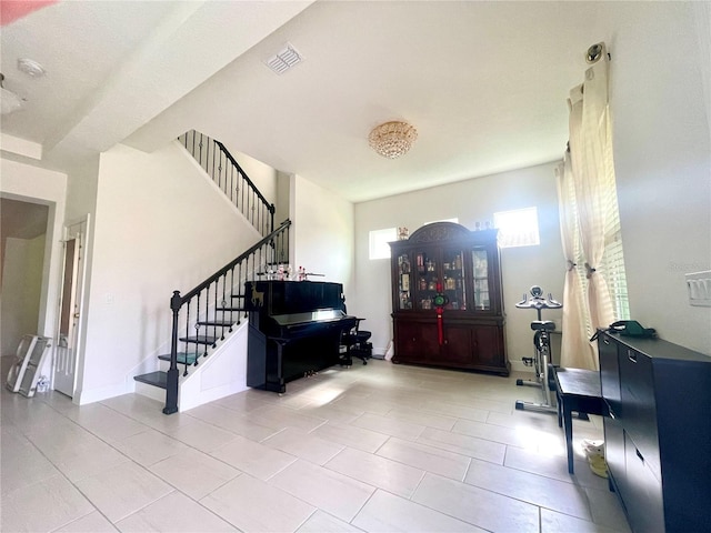 16611 Toccoa Row, Winter Garden, FL 34787 - entrance foyer featuring stairway and tile patterned flooring