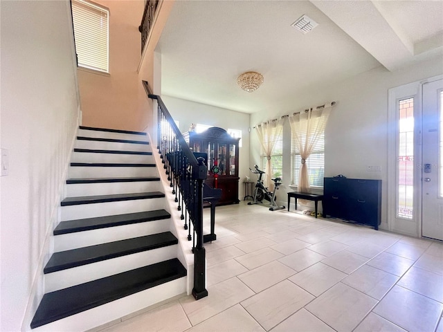 16611 Toccoa Row, Winter Garden, FL 34787 - entryway featuring stairs and light tile patterned floors