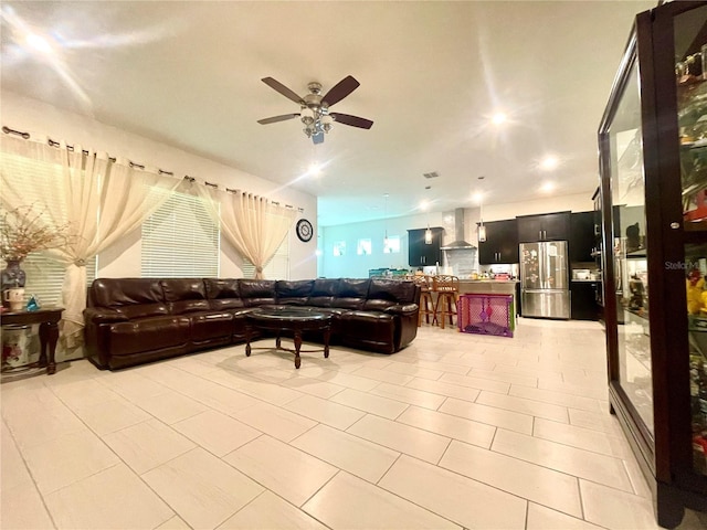 16611 Toccoa Row, Winter Garden, FL 34787 - living area featuring a ceiling fan and light tile patterned floors