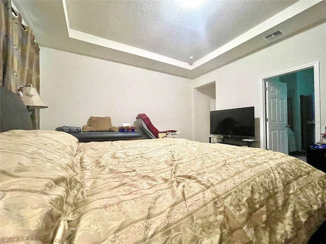 16611 Toccoa Row, Winter Garden, FL 34787 - bedroom featuring a tray ceiling