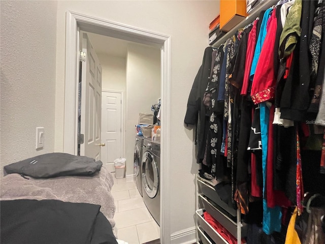 16611 Toccoa Row, Winter Garden, FL 34787 - washroom with washing machine and clothes dryer and tile patterned floors