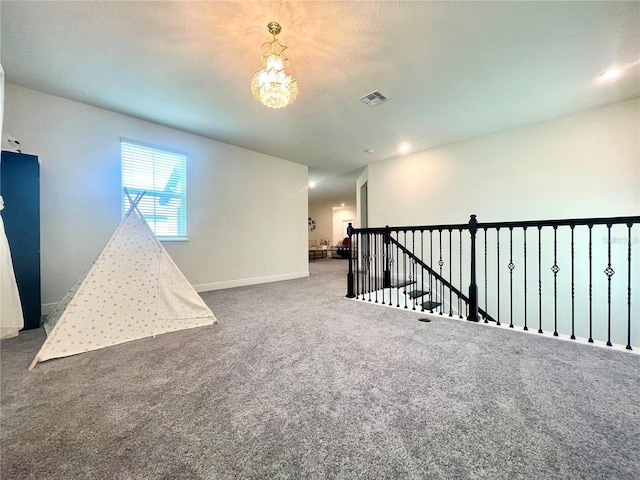 16611 Toccoa Row, Winter Garden, FL 34787 - carpeted empty room with a chandelier and recessed lighting