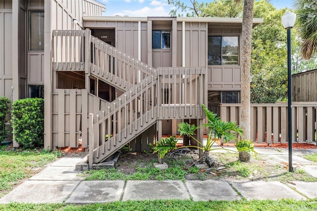 5301 Burning Tree Dr Unit F, Orlando, FL 32811 - view of property with stairway