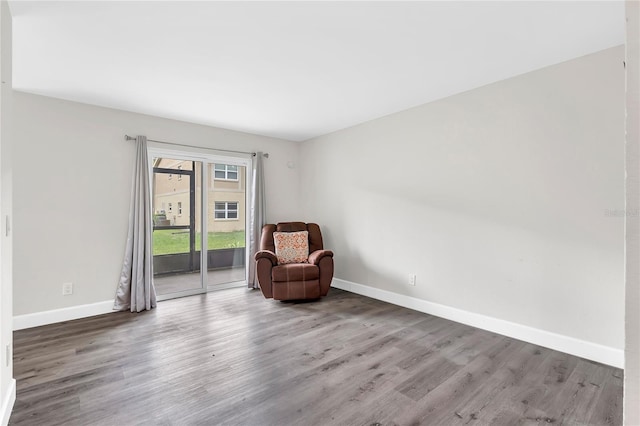9900 Sweepstakes Ln Unit 1, Orlando, FL 32837 - unfurnished room with baseboards and wood finished floors